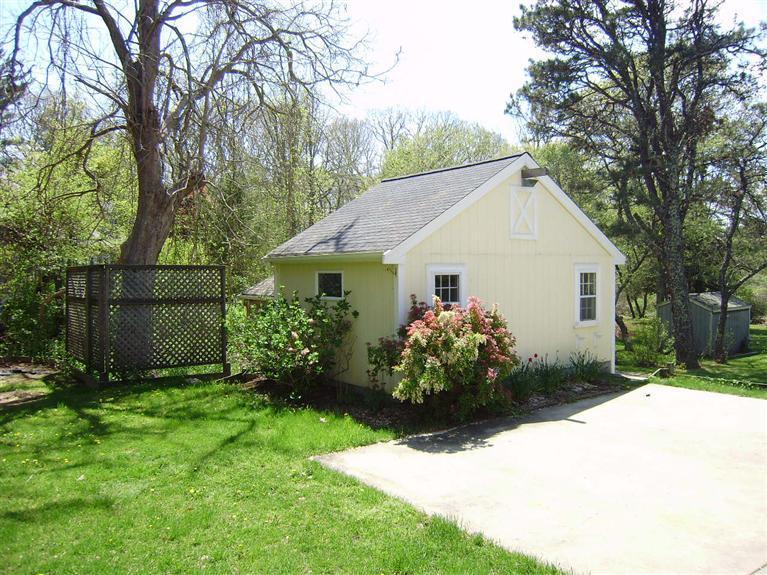 19 Shore Road Bourne, MA 02532 - Photo 18 of 21 a view of a house with garden