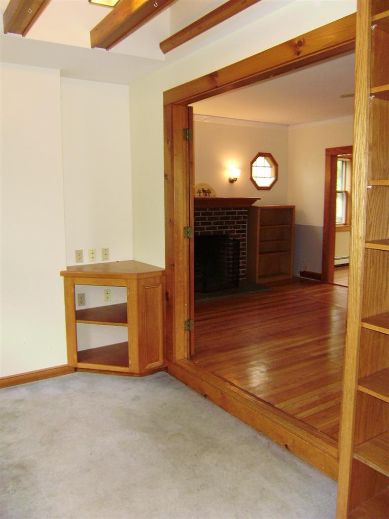 19 Shore Road Bourne, MA 02532 - Photo 9 of 21 a view of an empty room and a window