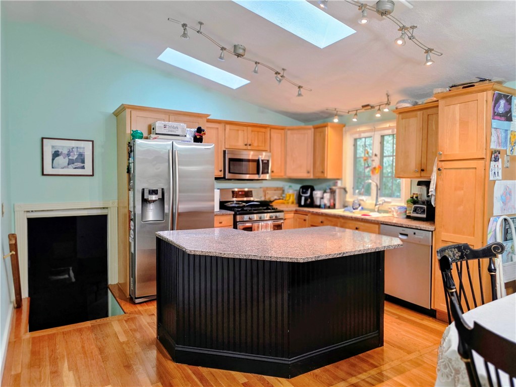 5 Mill Wheel Road Warwick, RI 02886 - Photo 5 of 36 Granite Center Island Stainless appliances, vaulted with skylights