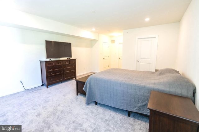 a bedroom with a bed and furniture