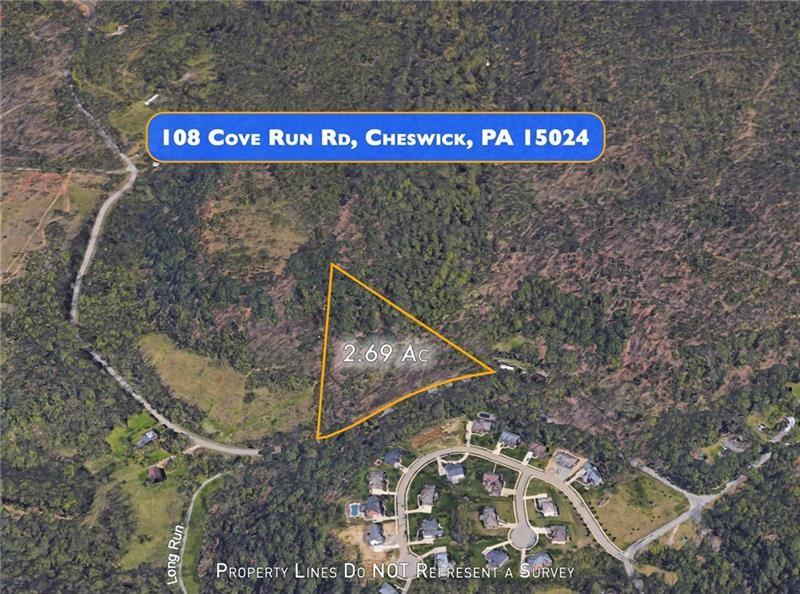 108 Cove Run Road Cheswick, PA 15024 - Photo 2 of 4 a sign that is on a brick wall