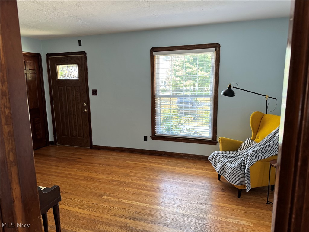 2809 Ralph Avenue Cleveland, OH 44109 - Photo 5 of 35 Entryway featuring light original hardwood flooring and baseboards