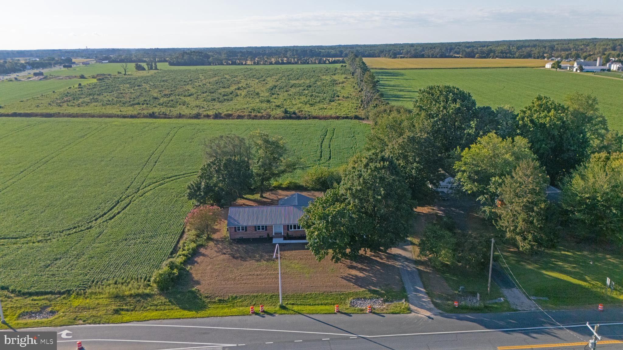 26854 Broadkill Road Milton, DE 19968 - Photo 13 of 56 a view of a lake with a yard