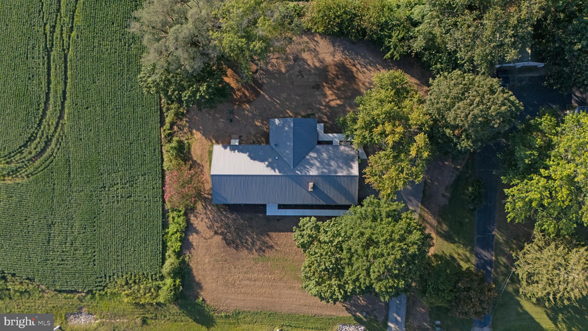 26854 Broadkill Road Milton, DE 19968 - Photo 20 of 56 an aerial view of a house with a yard