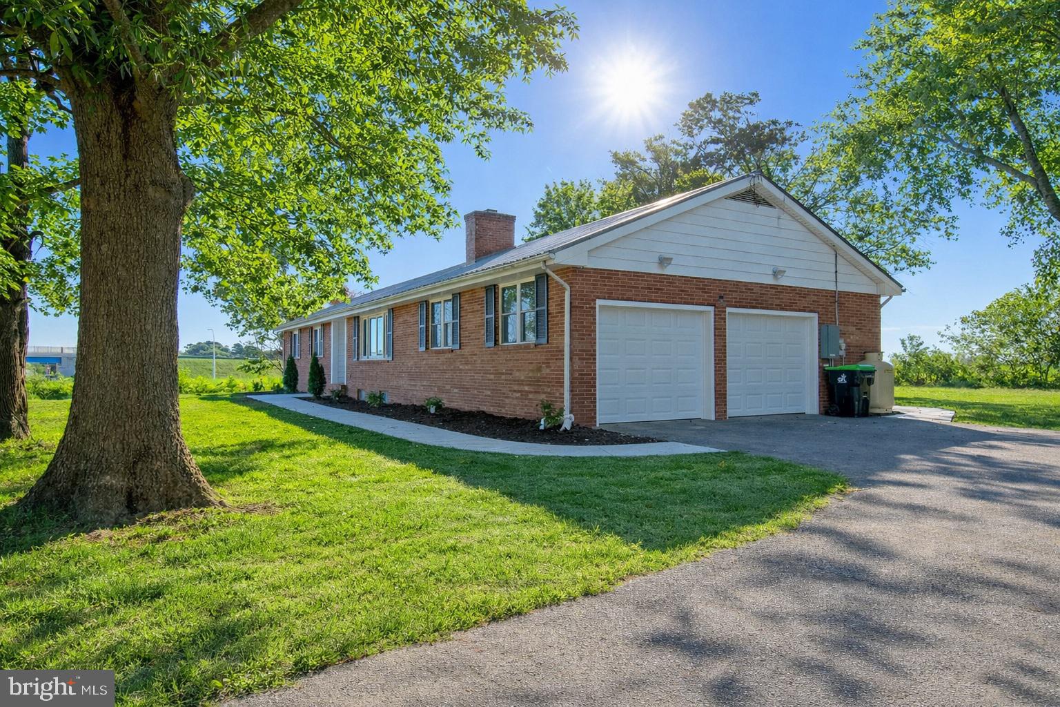 26854 Broadkill Road Milton, DE 19968 - Photo 2 of 56 a view of a house with a yard