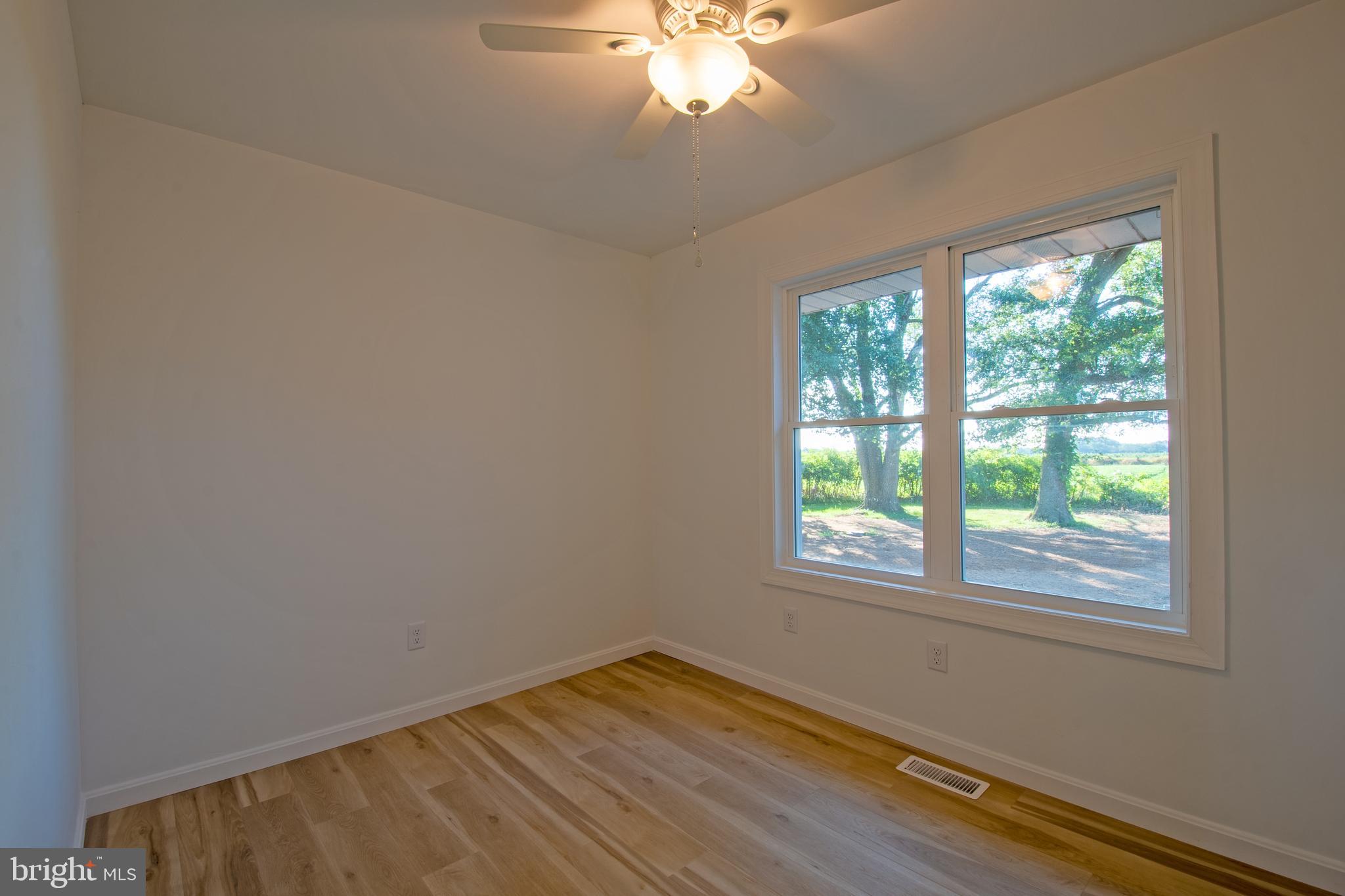 26854 Broadkill Road Milton, DE 19968 - Photo 38 of 56 a view of empty room with window