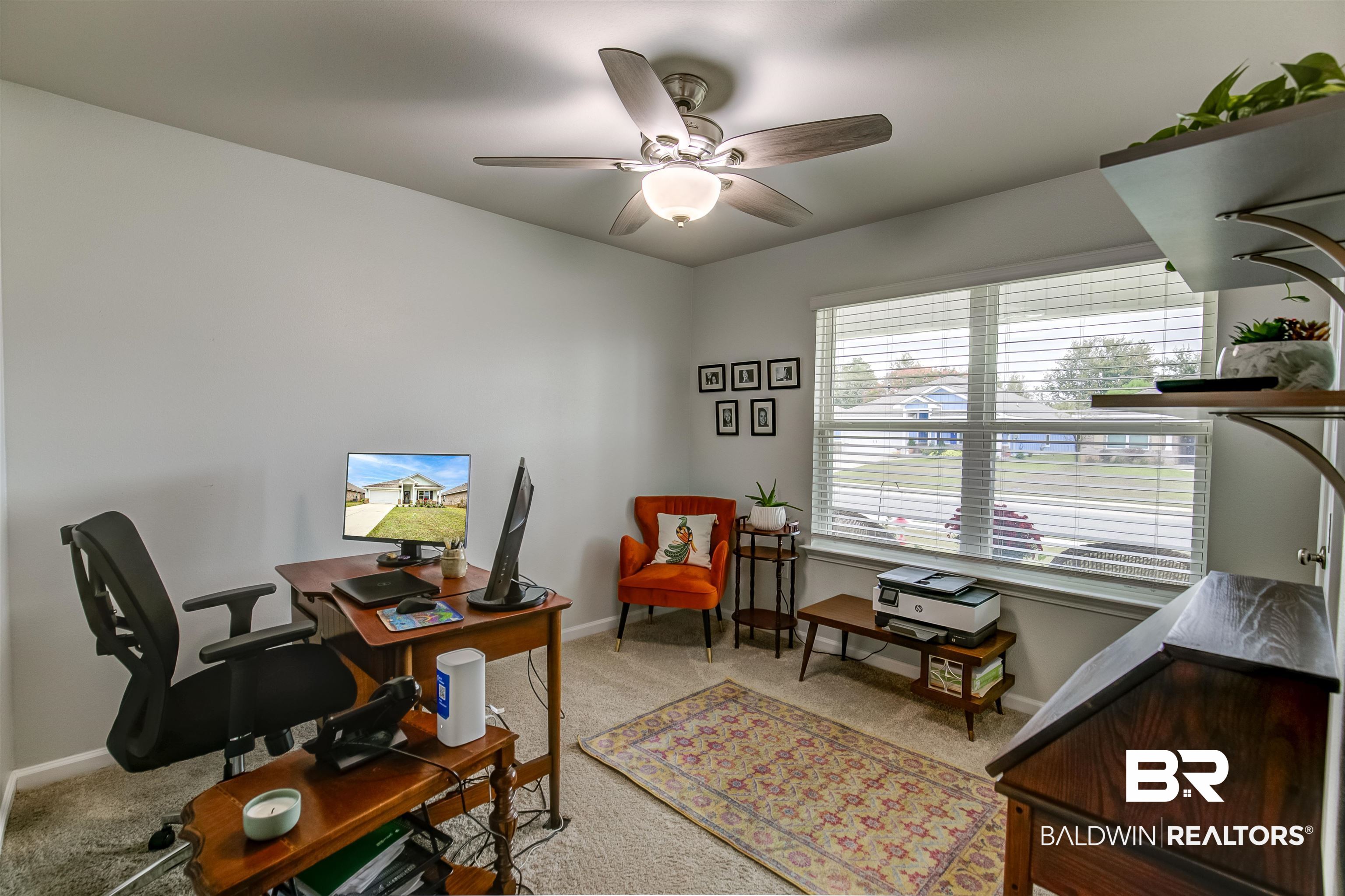8033 Irwin Loop Daphne, AL 36526 - Photo 28 of 38 Room with light gray walls and carpeted flooring