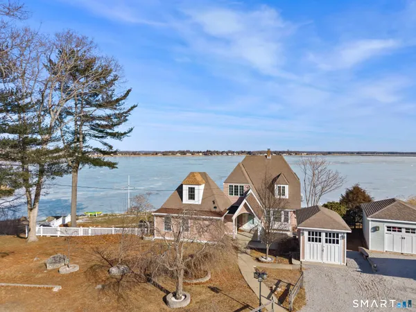 a view of a street with a building in the background