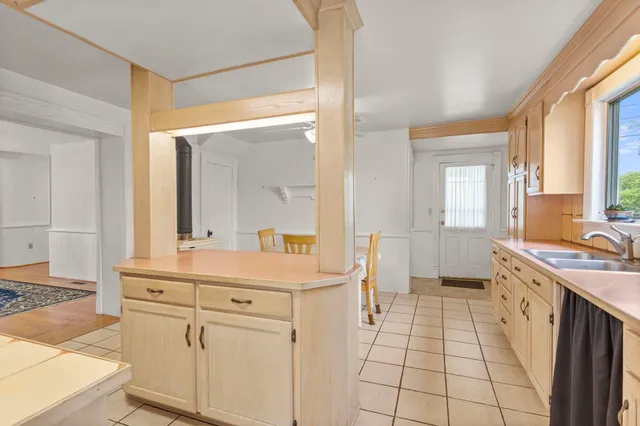 a view of a sink and a mirror