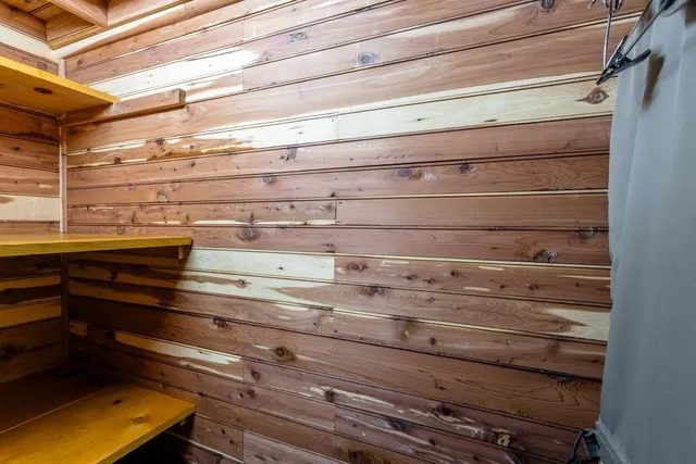 a view of an entryway with wooden floor