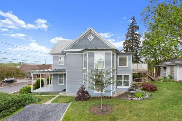 a view of front door and porch of the house