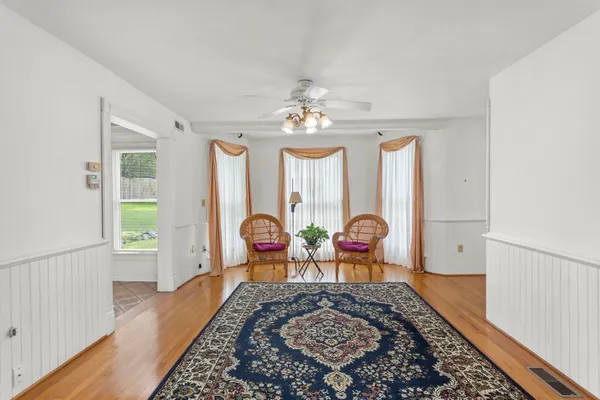 view of living room with furniture and a table