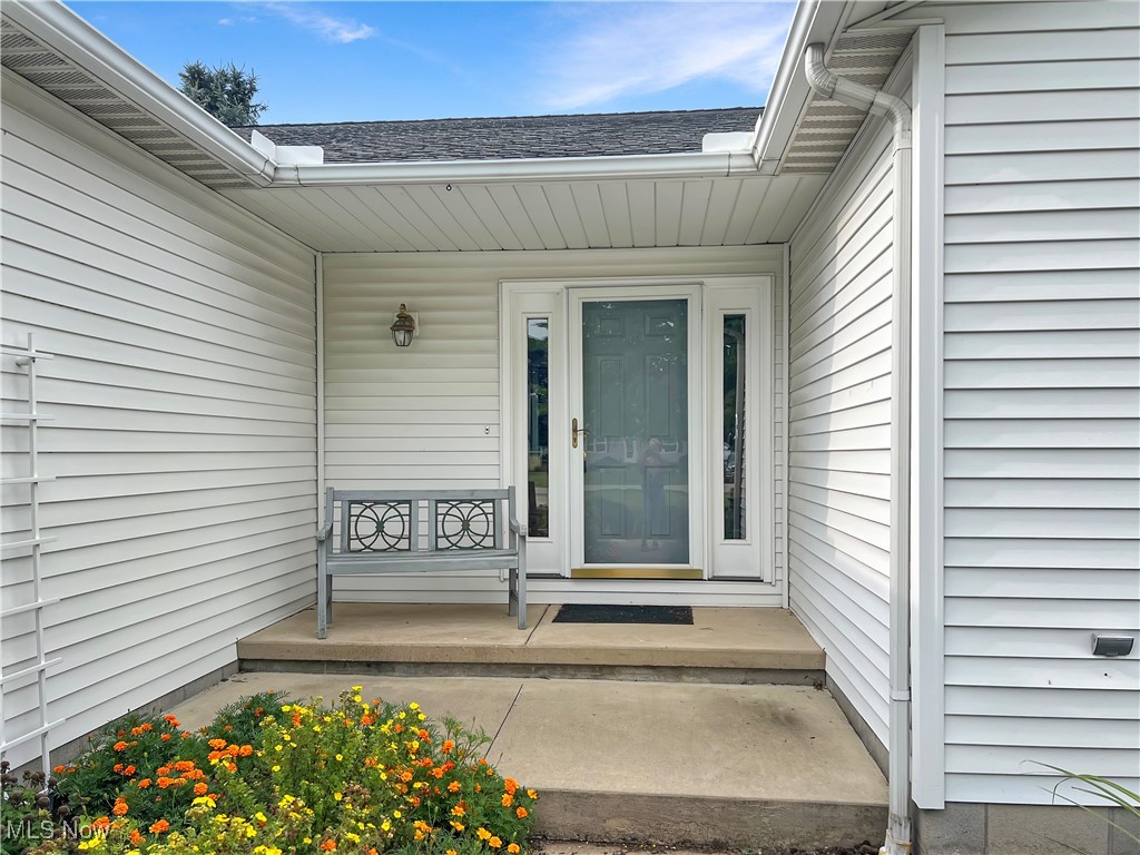 3801 Hull Road Huron, OH 44839 - Photo 20 of 24 Entrance to property featuring roof with shingles