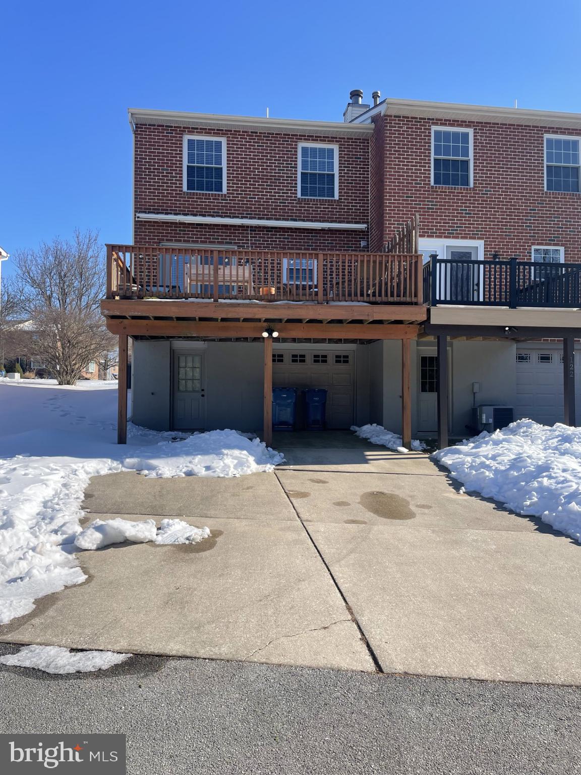 124 Longford Road West Chester, PA 19380 - Photo 24 of 28 Rear shows large deck, garage & 3 parking spots