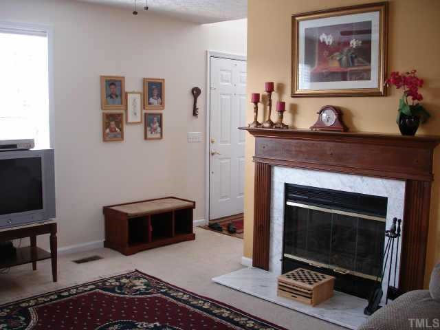 1207 Lexington Farm Road Apex, NC 27502 - Photo 1 of 10 Enjoy this cozy family room with gas log fireplace! Other