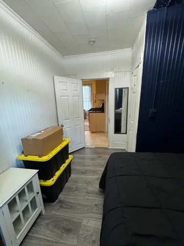 a bedroom with furniture and a bed