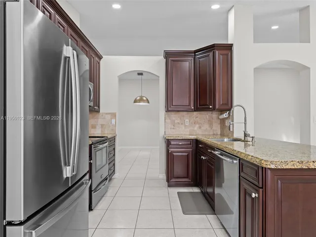 $715,000 | 1861 Northwest 142nd Avenue, Pembroke Pines, FL 33028