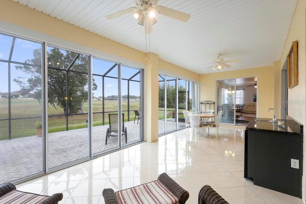 11767 Southeast 176th Place Road Summerfield, FL 34491 - Photo 28 of 37 LANAI with TILE FLOORING