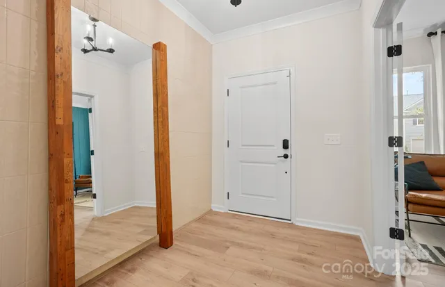 a view of entryway with wooden floor