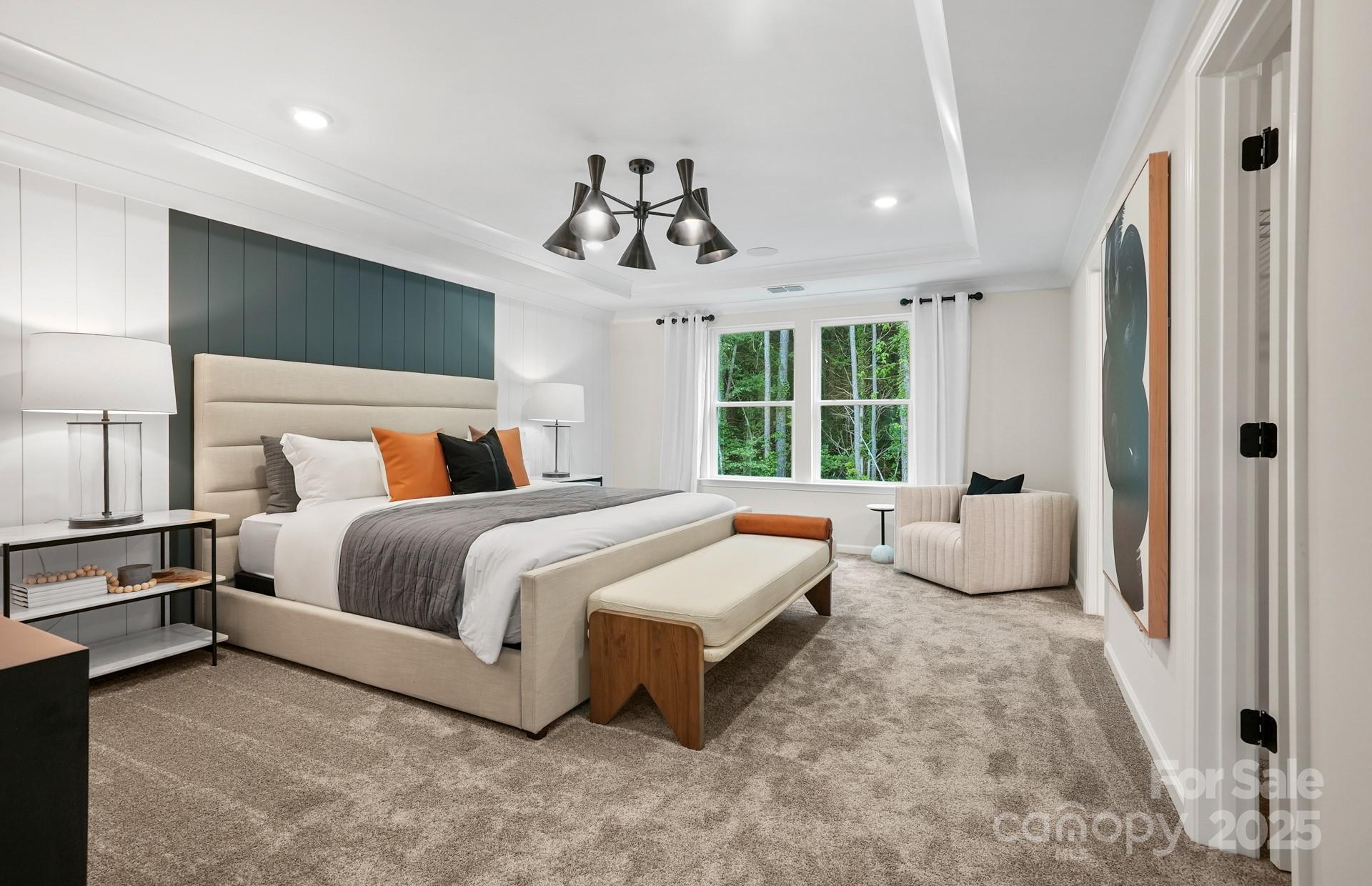 12016 Rails Court, Unit 516 Charlotte, NC 28278 - Photo 26 of 39 a spacious bedroom with a bed and window