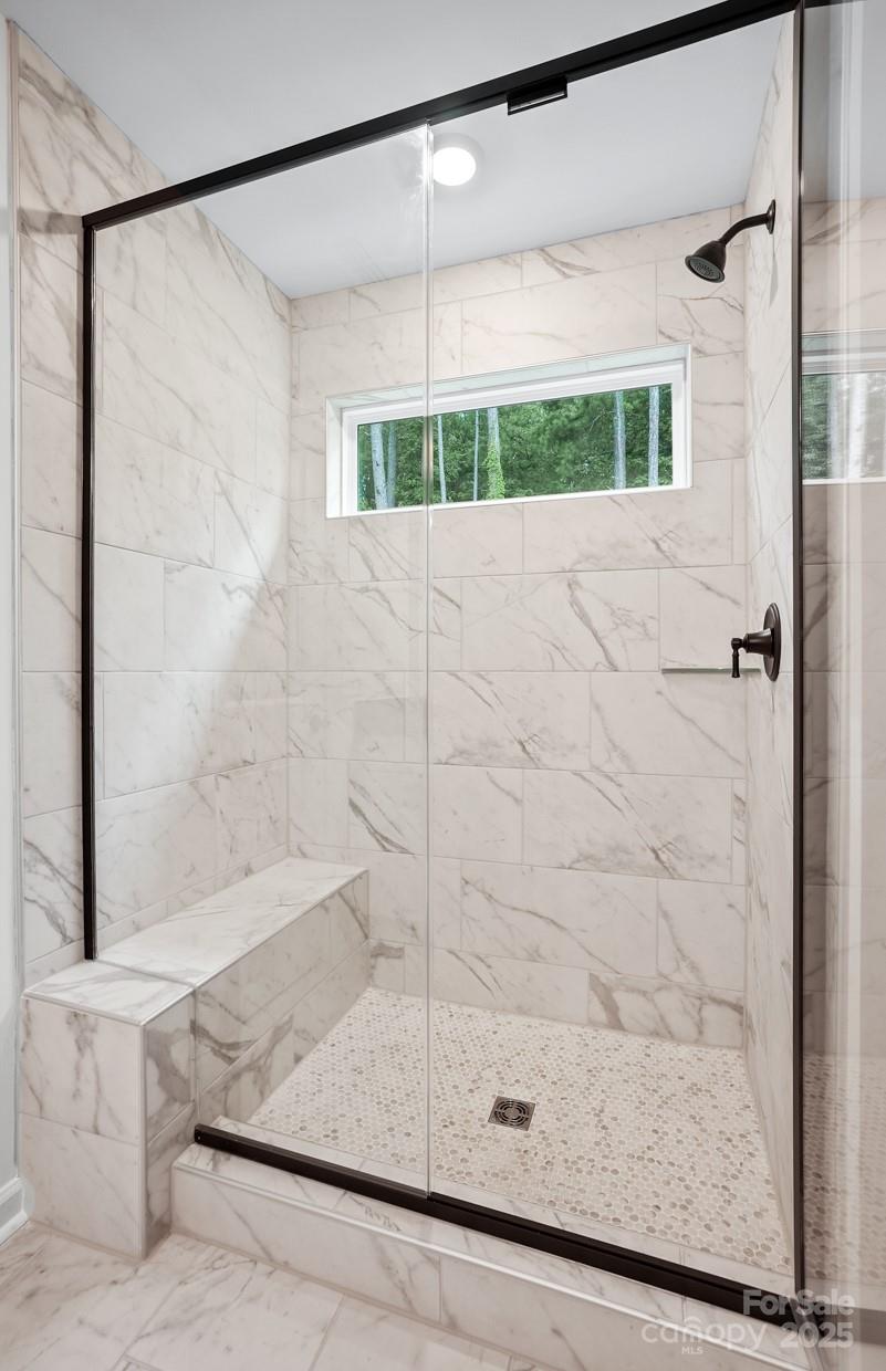 12016 Rails Court, Unit 516 Charlotte, NC 28278 - Photo 31 of 39 a bathroom with a shower and a sink