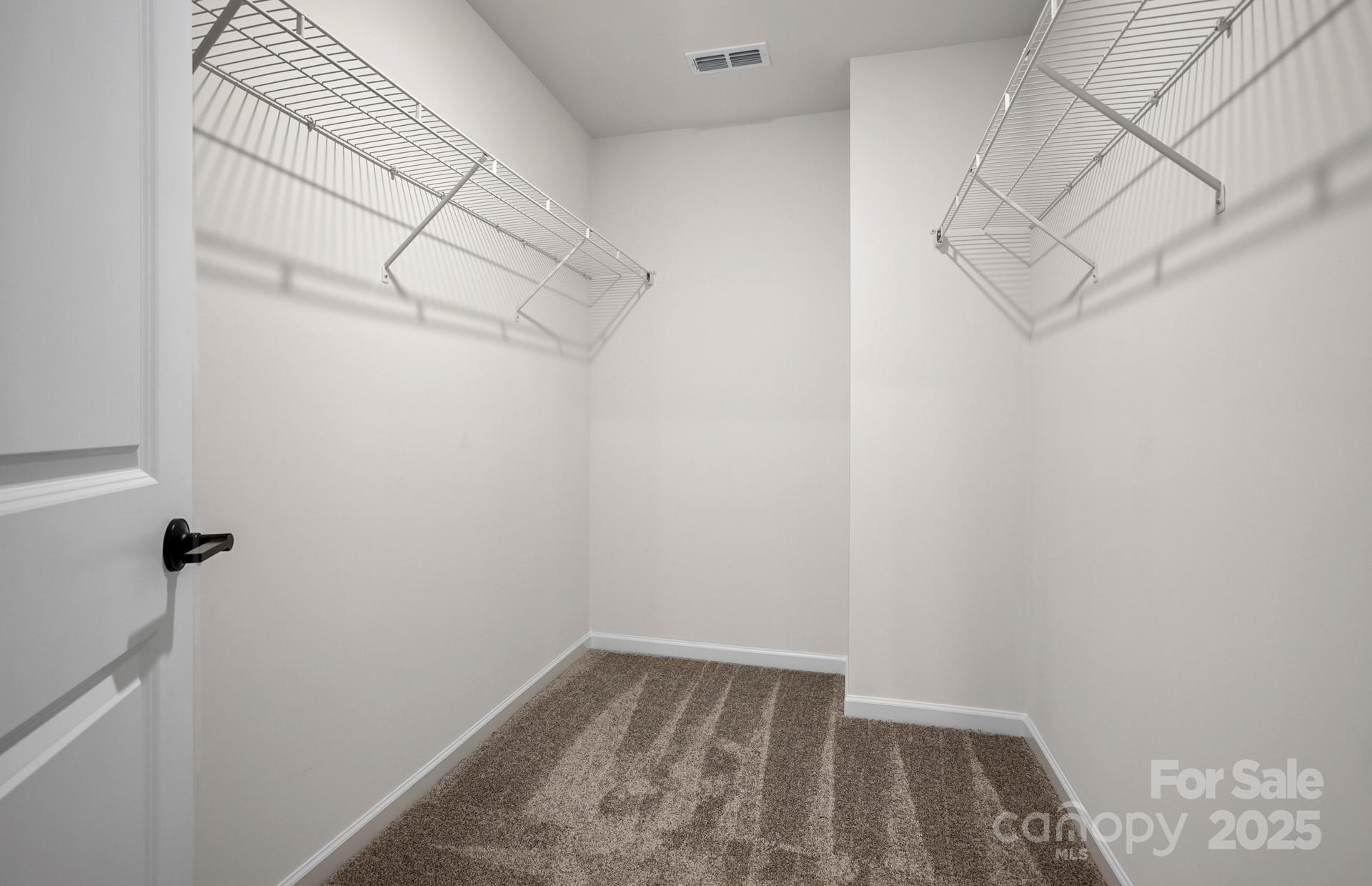 12016 Rails Court, Unit 516 Charlotte, NC 28278 - Photo 32 of 39 a view of small space with racks on the wall