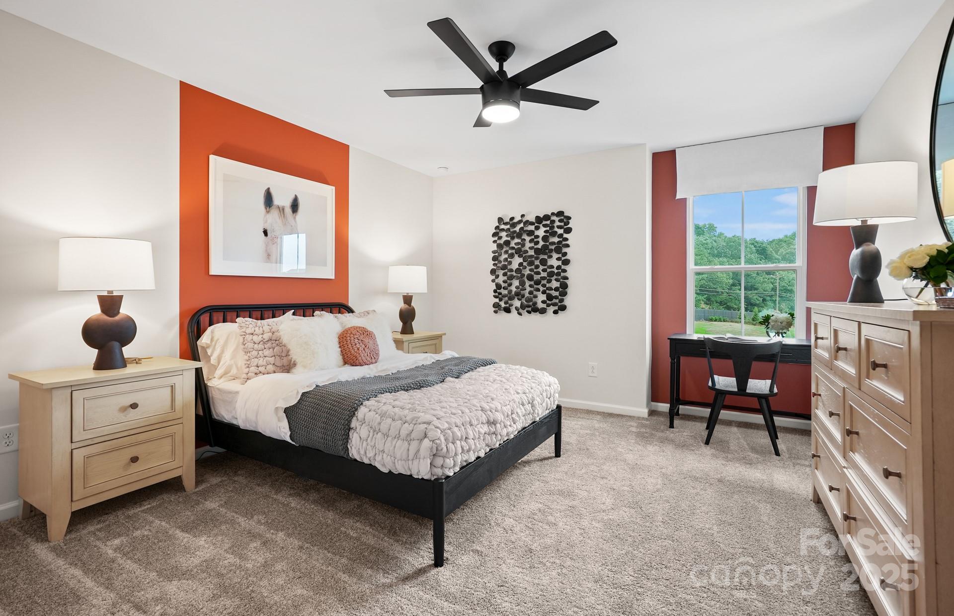 12016 Rails Court, Unit 516 Charlotte, NC 28278 - Photo 36 of 39 a bedroom with a bed and a dresser next to a window