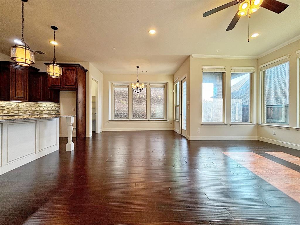 3037 Crestwater Ridge Keller, TX 76248 - Photo 11 of 25 a view of an empty room with window and wooden floor