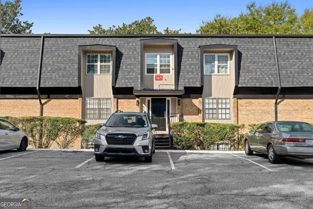 a car parked in front of a house