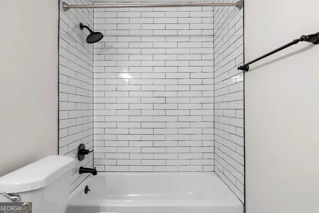 a dining room with furniture and entryway