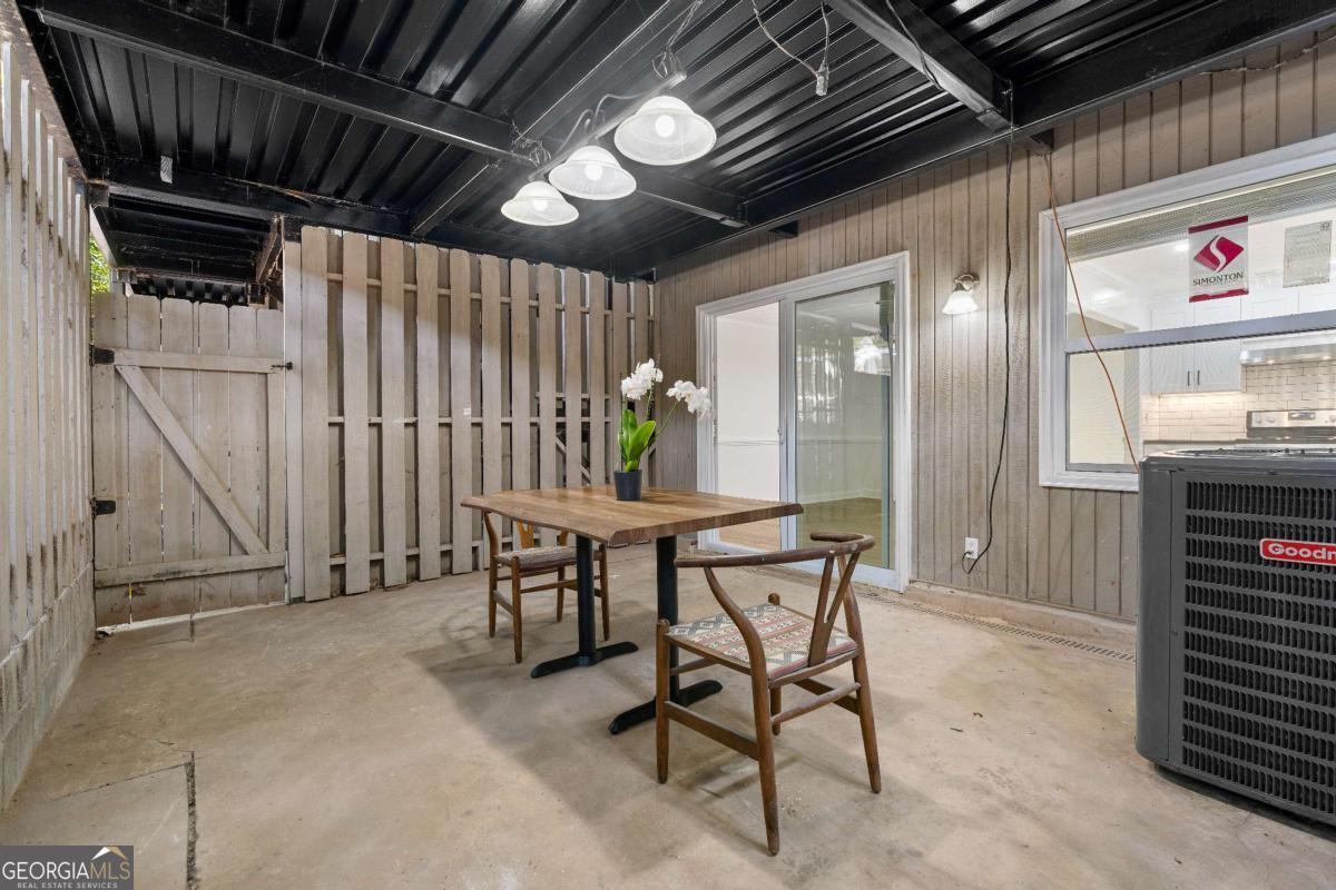 365 Winding River Drive Atlanta, GA 30350 - Photo 25 of 34 a dining room with furniture and entryway