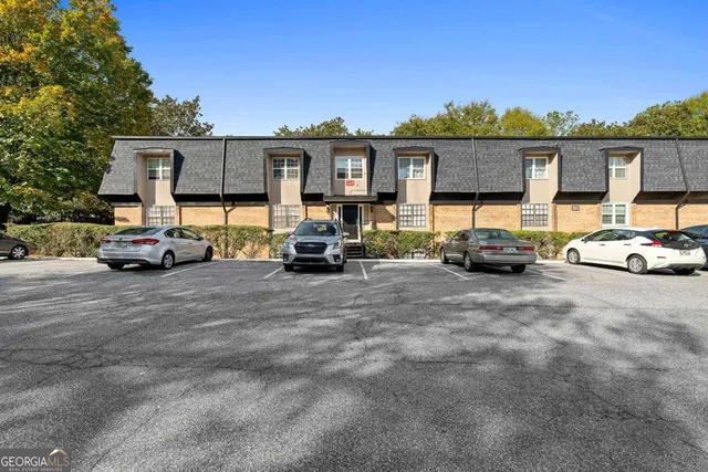 a car parked in front of a house