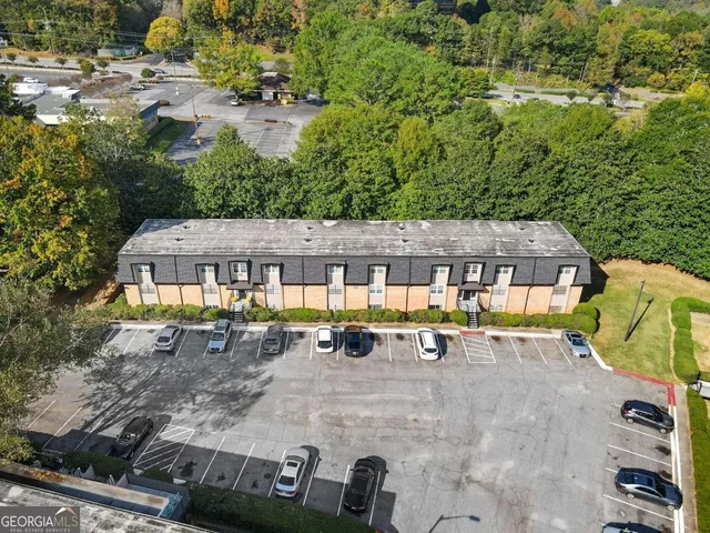 an aerial view of house with yard
