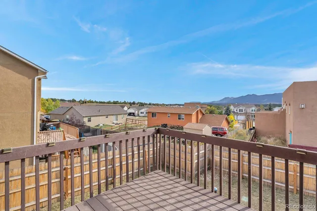 a view of city from a balcony