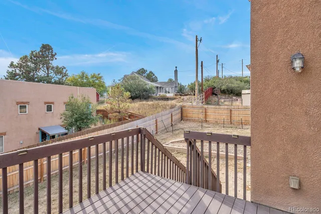 a view of a balcony with an outdoor space