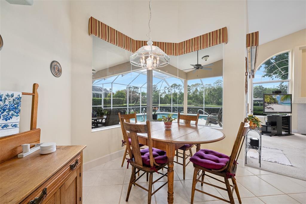 8 Gale Lane Ormond Beach, FL 32174 - Photo 19 of 77 a view of a dining room with furniture window and outside view