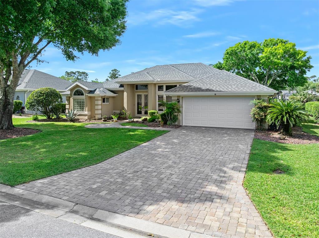 8 Gale Lane Ormond Beach, FL 32174 - Photo 2 of 77 a front view of a house with a yard