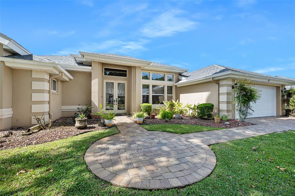 8 Gale Lane Ormond Beach, FL 32174 - Photo 8 of 77 a view of a house with backyard porch and sitting area