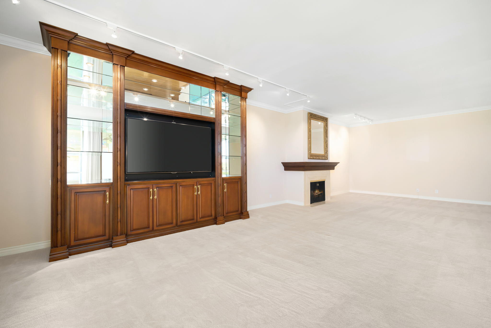 900 Island Drive, Unit 304 Rancho Mirage, CA 92270 - Photo 11 of 27 a view of a livingroom with a flat screen tv