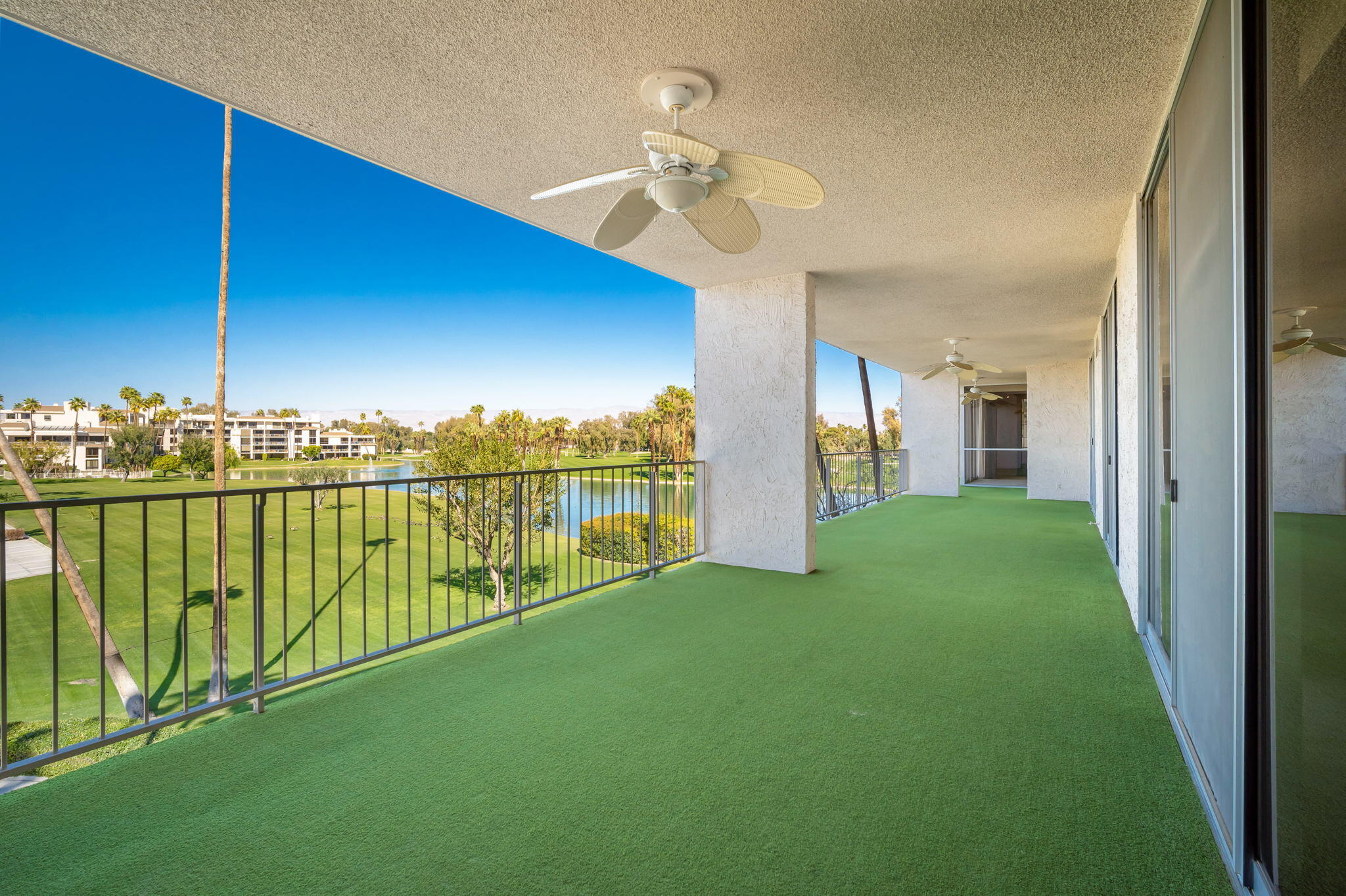 900 Island Drive, Unit 304 Rancho Mirage, CA 92270 - Photo 21 of 27 a view of a balcony with lake view