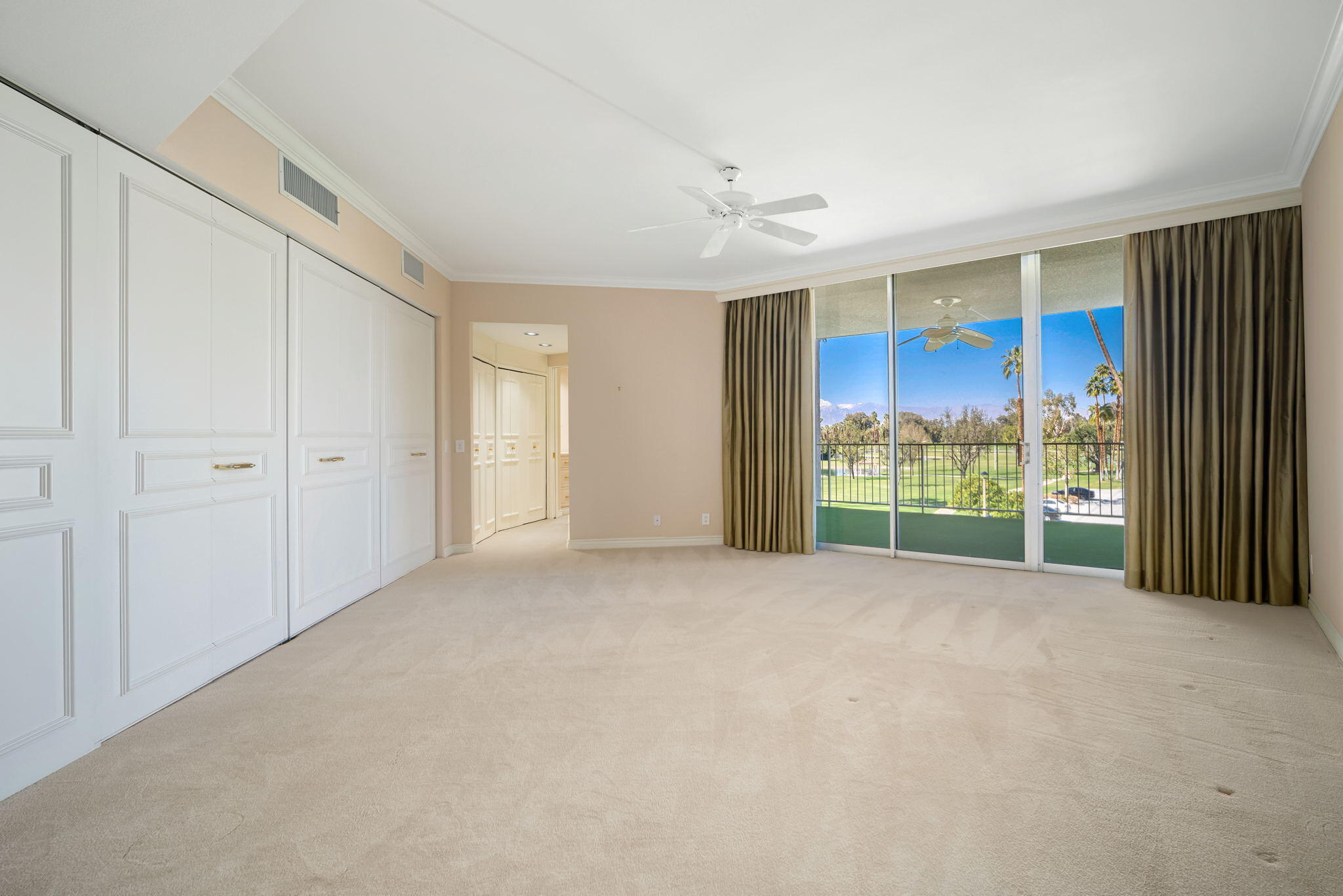 900 Island Drive, Unit 304 Rancho Mirage, CA 92270 - Photo 23 of 27 a view of an empty room with a window