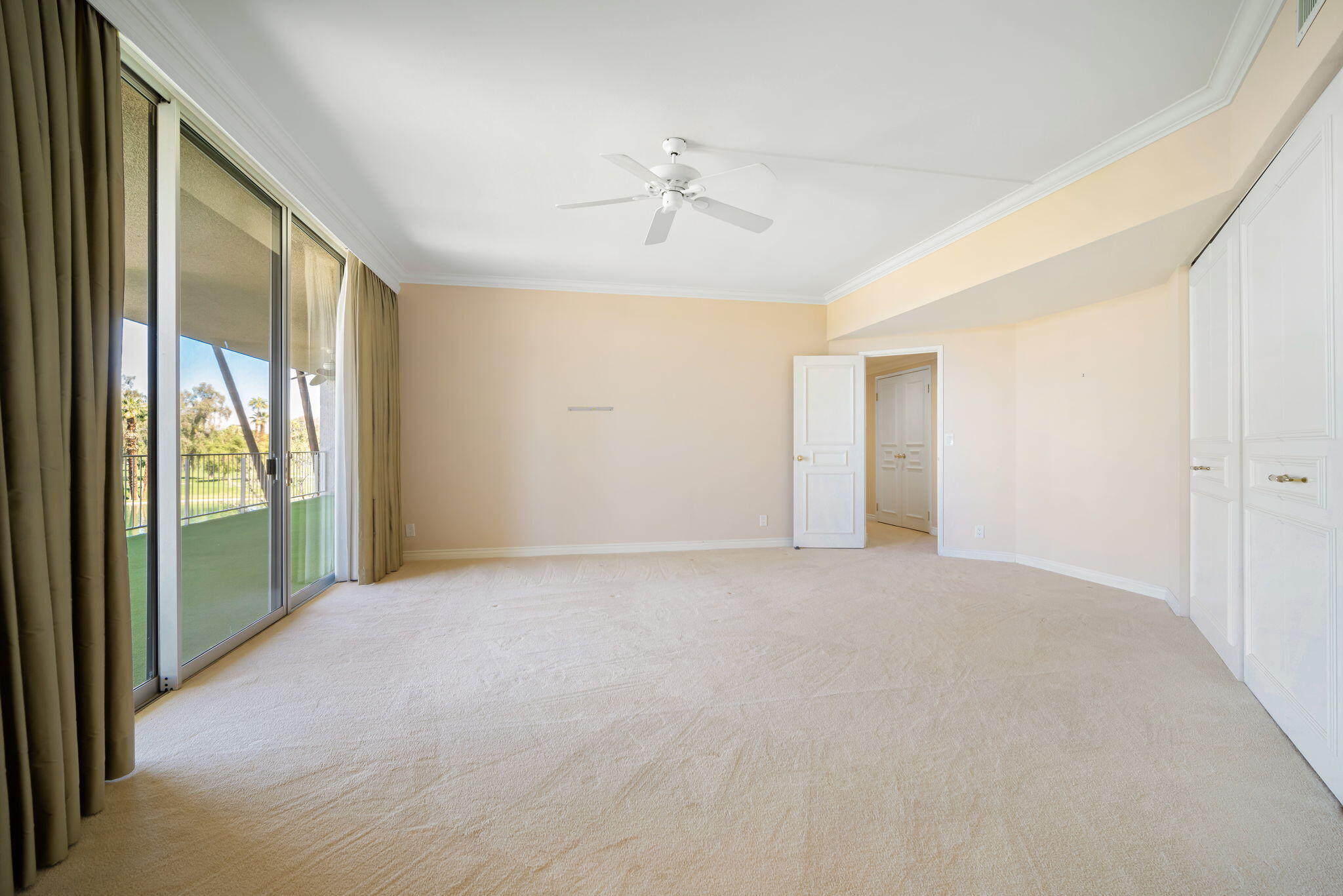 900 Island Drive, Unit 304 Rancho Mirage, CA 92270 - Photo 25 of 27 a view of an empty room with a window