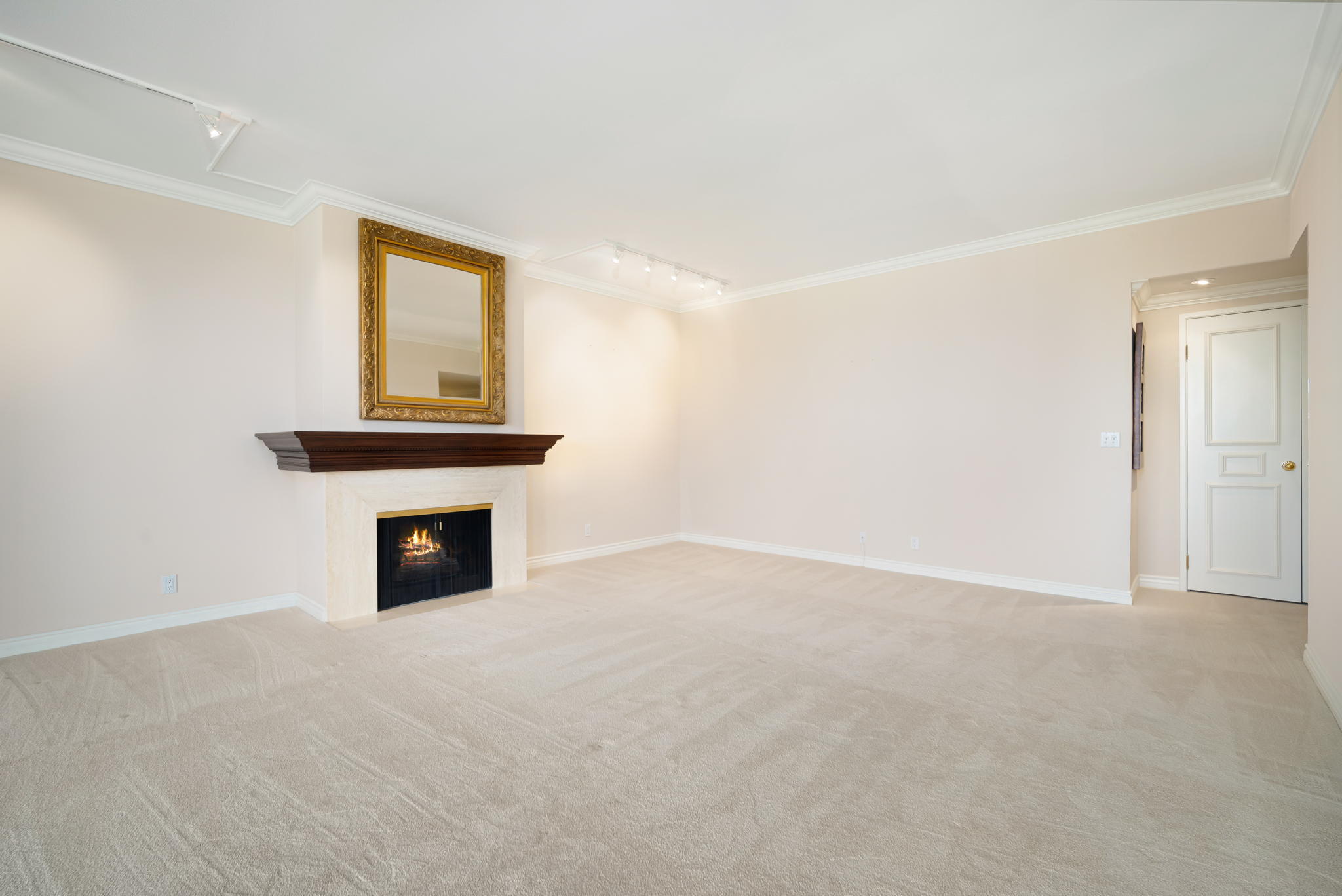 900 Island Drive, Unit 304 Rancho Mirage, CA 92270 - Photo 7 of 27 a view of an empty room with a window