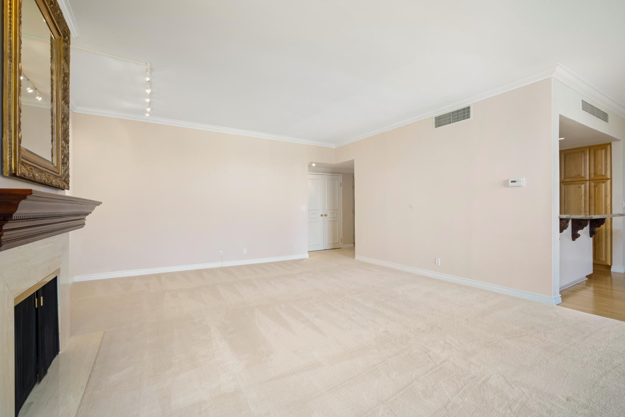 900 Island Drive, Unit 304 Rancho Mirage, CA 92270 - Photo 8 of 27 a view of an empty room with a window