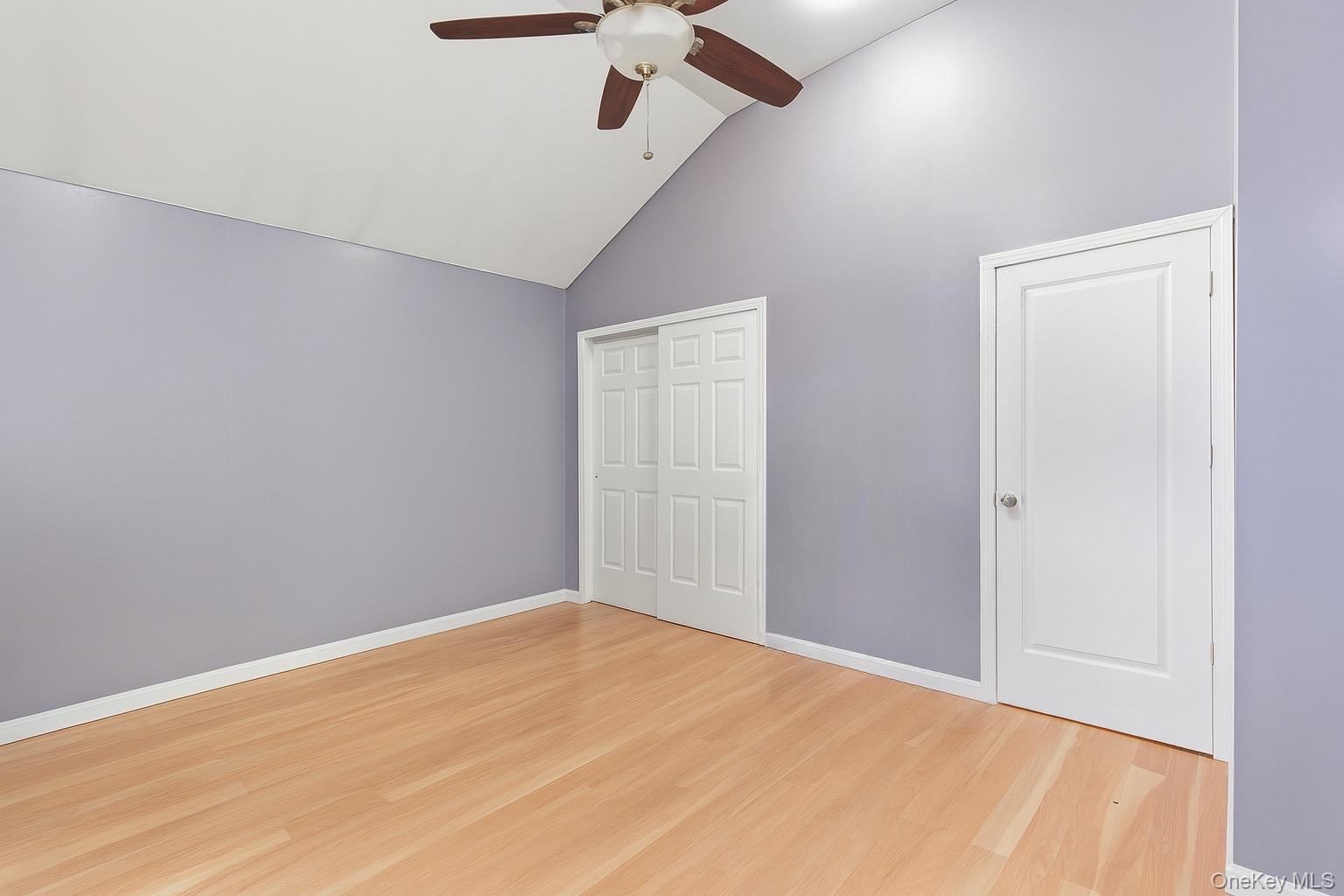 36 Ralph Avenue Brentwood, NY 11717 - Photo 11 of 23 a view of empty room with a ceiling fan