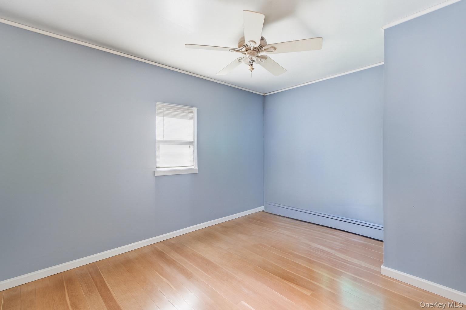 36 Ralph Avenue Brentwood, NY 11717 - Photo 12 of 23 a view of a room with a window