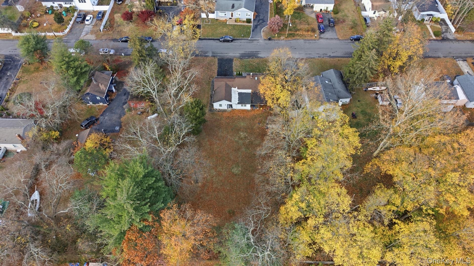 36 Ralph Avenue Brentwood, NY 11717 - Photo 23 of 23 an aerial view of residential houses with outdoor space