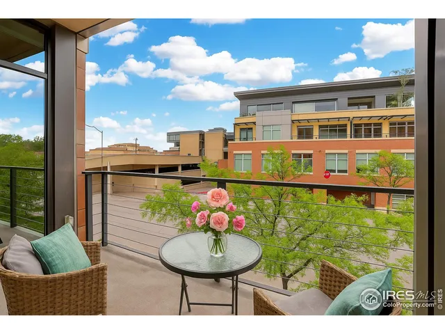 a view of a chairs and table in patio
