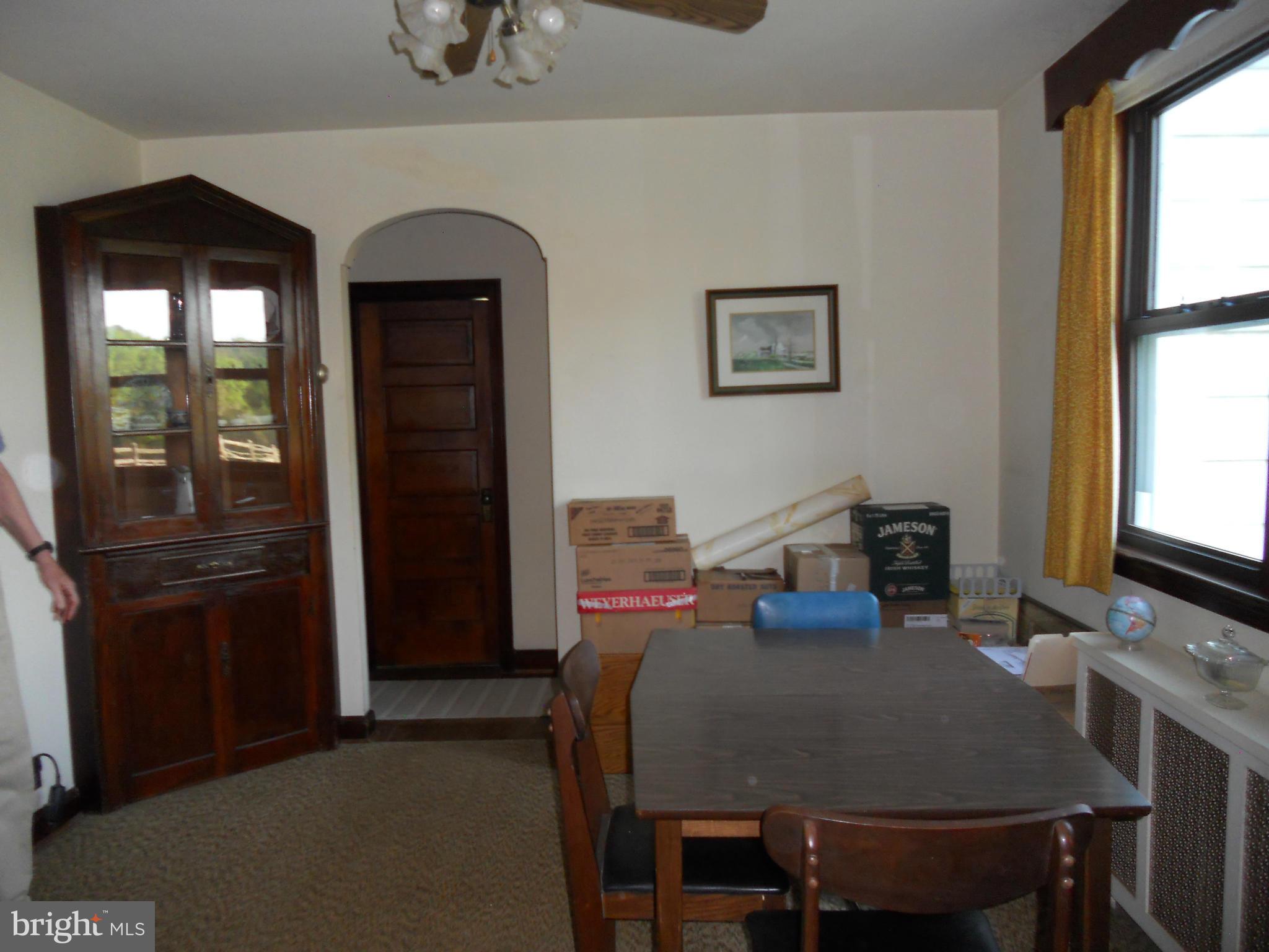 2600 Briggs Chaney Road Silver Spring, MD 20905 - Photo 5 of 20 a view of a dining room with furniture and window