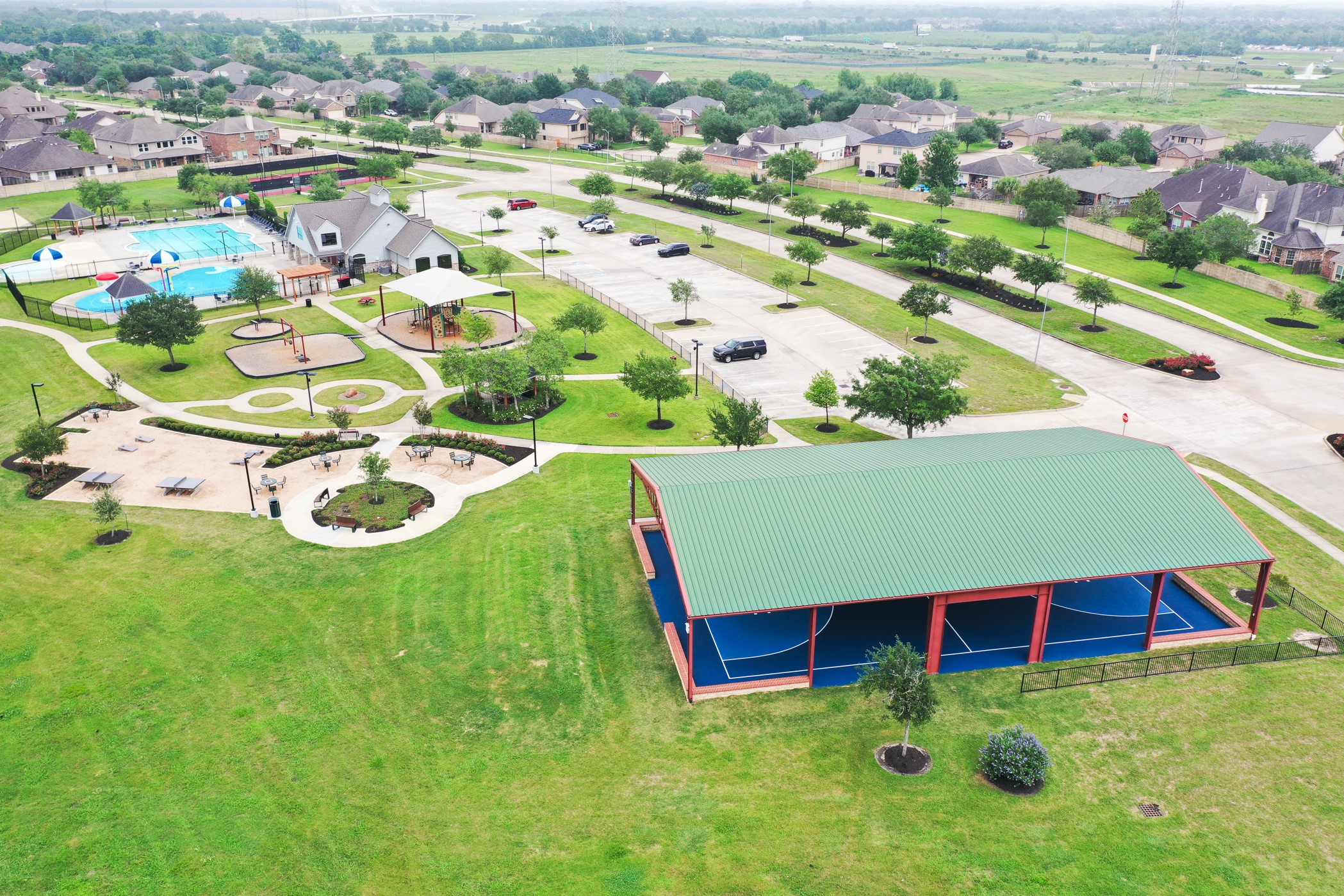 9438 Emerald Lakes Drive Rosharon, TX 77583 - Photo 33 of 36 an aerial view of residential houses with outdoor space and trees